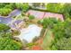 Aerial view of community pool, tennis courts, clubhouse, parking and green space at 2678 Neighborhood S Walk, Villa Rica, GA 30180