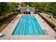 Enjoy the community pool with lane dividers, tables with umbrellas, and a nearby playground at 2678 Neighborhood S Walk, Villa Rica, GA 30180