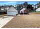 Charming single-Gathering home with a well-manicured lawn and attached two-car garage at 3151 Victoria Place Dr, Loganville, GA 30052