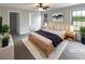 Bedroom featuring neutral colors, soft carpet, and a cozy atmosphere at 3151 Victoria Place Dr, Loganville, GA 30052