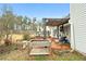 Well-maintained backyard patio area with furniture, perfect for outdoor entertaining at 40 Berkshire Run, Covington, GA 30016