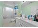 Bathroom featuring a vanity with a sink, mirror, toilet, and a tub with a shower curtain at 40 Berkshire Run, Covington, GA 30016