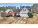 Charming single-Gathering home featuring a two-car garage and a well-manicured front yard at 40 Berkshire Run, Covington, GA 30016