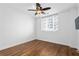 Cozy bedroom featuring hardwood floors, a ceiling fan, and natural light at 1421 Peachtree Ne St # 310, Atlanta, GA 30309