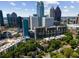 Aerial view of a city skyline, with trees and neighborhood views at 145 15Th Ne St # 1430, Atlanta, GA 30309