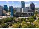 Aerial view of the city skyline, featuring trees and neighborhood views at 145 15Th Ne St # 1430, Atlanta, GA 30309