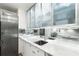 Updated kitchen with frosted cabinets, marble countertops, and stainless steel refrigerator at 145 15Th Ne St # 1430, Atlanta, GA 30309