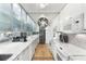 Bright kitchen features white cabinets, marble countertops, and stainless steel appliances at 145 15Th Ne St # 1430, Atlanta, GA 30309