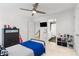 Bedroom with ceiling fan, with an adjacent bathroom and bedroom at 1624 Duncan Nw Dr, Atlanta, GA 30318