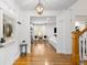 Bright foyer with hardwood floors leads to the living room with lots of natural light at 1624 Duncan Nw Dr, Atlanta, GA 30318