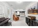 Expansive main bedroom with seating area, piano, and ample natural light, a luxurious sanctuary at 1624 Duncan Nw Dr, Atlanta, GA 30318