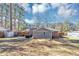 Backyard view of the home, shed, and patio area at 2187 Freydale Se Rd, Marietta, GA 30067