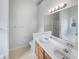 Bright bathroom featuring dual sinks and lots of light at 351 Beckenham Ln, Dacula, GA 30019