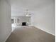 Bright living room featuring fireplace, neutral walls and plush carpet at 351 Beckenham Ln, Dacula, GA 30019