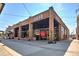 Exterior view of Good Word Brewing & Public House with brick facade, black accents, and an inviting open entrance at 4170 Cavalier Way, Duluth, GA 30097