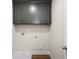 Gray cabinets above a white utility sink in a laundry room at 4170 Cavalier Way, Duluth, GA 30097