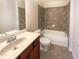 Cozy bathroom with tub and single vanity at 4556 Creekside Cv, Atlanta, GA 30349