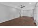 Spacious living room with hardwood floors, neutral paint, and natural light at 4138 Hickory Dr, Powder Springs, GA 30127