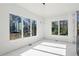 Bright dining area filled with natural light from large windows overlooking the landscape at 1410 Lavista Ne Rd, Atlanta, GA 30324