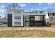 Modern home with black and white exterior and large windows showcasing a contemporary design at 1410 Lavista Ne Rd, Atlanta, GA 30324