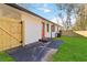 A fenced in backyard with a red door on a white brick home at 1796 Arkose Se Dr, Atlanta, GA 30316