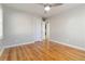 Spacious bedroom featuring gleaming hardwood floors and neutral walls at 1796 Arkose Se Dr, Atlanta, GA 30316