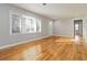 Bright living room featuring gleaming hardwood floors and neutral walls at 1796 Arkose Se Dr, Atlanta, GA 30316