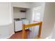 Hallway laundry area featuring a washer and dryer at 65 Devonshire Dr, Alpharetta, GA 30022