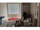 Bathroom with tub and window requires decluttering at 2690 Freemans Walk Dr, Dacula, GA 30019