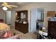 Bedroom showing dresser with mirror and entrance to a cluttered bathroom at 2690 Freemans Walk Dr, Dacula, GA 30019