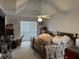Bedroom with a ceiling fan and natural light; in need of decluttering at 2690 Freemans Walk Dr, Dacula, GA 30019