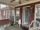 Screened-in porch area with ceiling fan and adjacent access to backyard and side yard at 2690 Freemans Walk Dr, Dacula, GA 30019