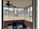 Enclosed sun room with view of fenced in yard at 2690 Freemans Walk Dr, Dacula, GA 30019