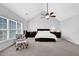 Large bedroom with vaulted ceiling, carpet, ceiling fan, and a queen-size bed at 4002 Forest Grove Nw Pass, Acworth, GA 30101