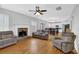 Spacious living room, eat-in kitchen with ample seating, and a cozy fireplace at 4002 Forest Grove Nw Pass, Acworth, GA 30101