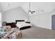 Large main bedroom with vaulted ceilings, ceiling fan, neutral color scheme, and ample space for seating at 4002 Forest Grove Nw Pass, Acworth, GA 30101