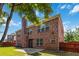 Expansive backyard featuring lush green grass, mature trees, and brick exterior at 480 Glenns Farm Way, Grayson, GA 30017