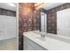 Bathroom vanity and shower featuring a vintage floral design at 480 Glenns Farm Way, Grayson, GA 30017