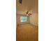 Large bedroom with neutral carpet, ceiling fan, and ample natural light at 480 Glenns Farm Way, Grayson, GA 30017