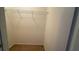 Walk-in closet with carpet flooring and a wire shelving unit for optimal storage at 480 Glenns Farm Way, Grayson, GA 30017