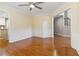 Dining room featuring hardwood floors, wainscoting, and ceiling fan at 480 Glenns Farm Way, Grayson, GA 30017