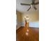Dining room boasts hardwood floors, wainscotting, and natural light with a view into the kitchen at 480 Glenns Farm Way, Grayson, GA 30017