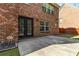 Home exterior showcasing patio and lush lawn perfect for outdoor living at 480 Glenns Farm Way, Grayson, GA 30017