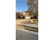 Charming two-story brick home featuring a two-car garage, well-maintained lawn and lush landscaping at 480 Glenns Farm Way, Grayson, GA 30017