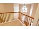 Foyer with high ceilings, beautiful natural light, and a wooden staircase at 480 Glenns Farm Way, Grayson, GA 30017