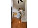 Inviting foyer featuring hardwood floors, high ceilings, staircase, and open view of adjacent rooms at 480 Glenns Farm Way, Grayson, GA 30017