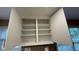 Kitchen cabinet featuring open doors and ample space for storage at 480 Glenns Farm Way, Grayson, GA 30017