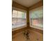 Kitchen space above a sink with tiled backsplash and two windows providing natural light at 480 Glenns Farm Way, Grayson, GA 30017
