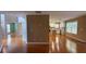 Expansive living area featuring hardwood floors connecting seamlessly to a modern kitchen with stainless steel appliances at 480 Glenns Farm Way, Grayson, GA 30017
