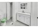 Elegant bathroom with sleek vanity, modern sink, and a well-lit mirror for a refreshing experience at 136 Victor Nw Cir, Atlanta, GA 30314